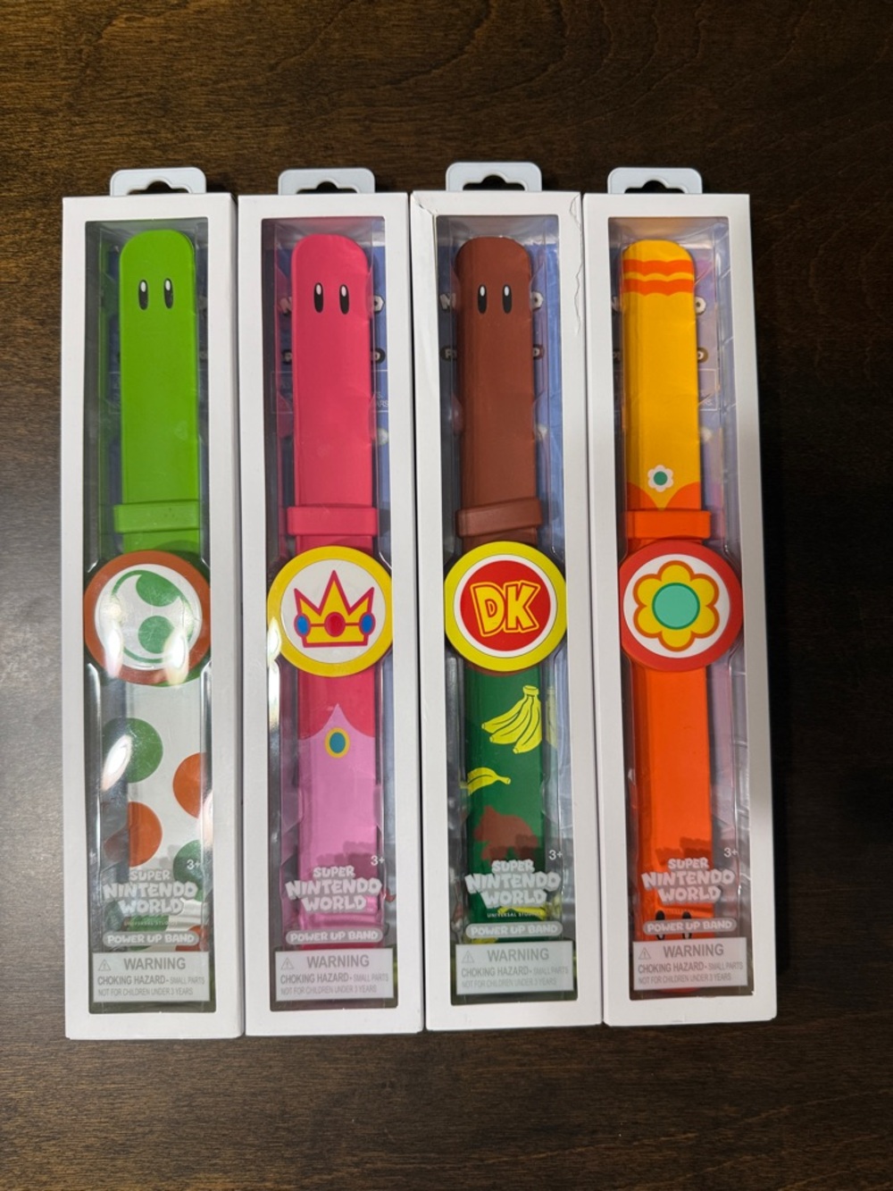 Super Nintendo World Character Power Up Bands - Green, Pink, Brown, Orange